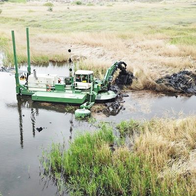 Diesel Power Type Multipurpose Amphibious Bucket Dredger with 120m3-700m3/h Capacity