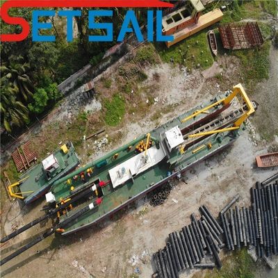 Soild Capacity 1200m3 Cummins Diesel Engine 26inch Cutter Suction Dredger with Anchor Boom